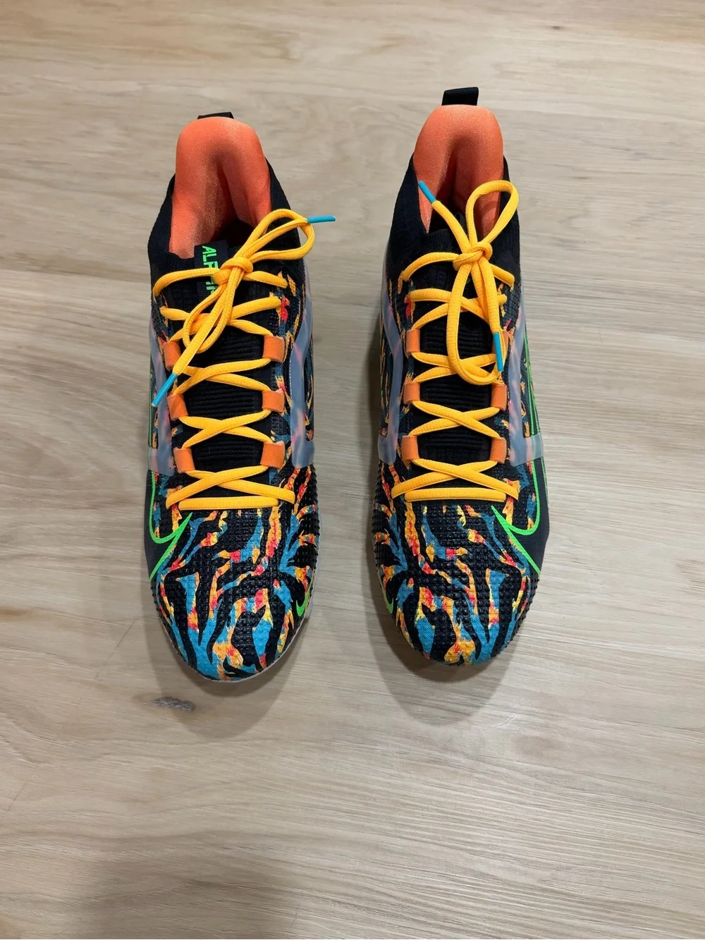 Nike Alpha Menace 4 Elite Cleat Travis Kelce Black, Orange, Yellow, Green, Blue